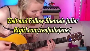 blonde Trans sweetie Plays The Guitar On webcam